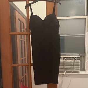 Chic Black Mini Dressblcm dress with lace cut outs!! Beautiful dress new w/tabs